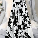 Elegant Floral Print Women's Skirt - High-Waisted, Flowy Design with Black Flowers on White Background, Polyester Blend, Machine Washable, Perfect for Spring & Fall